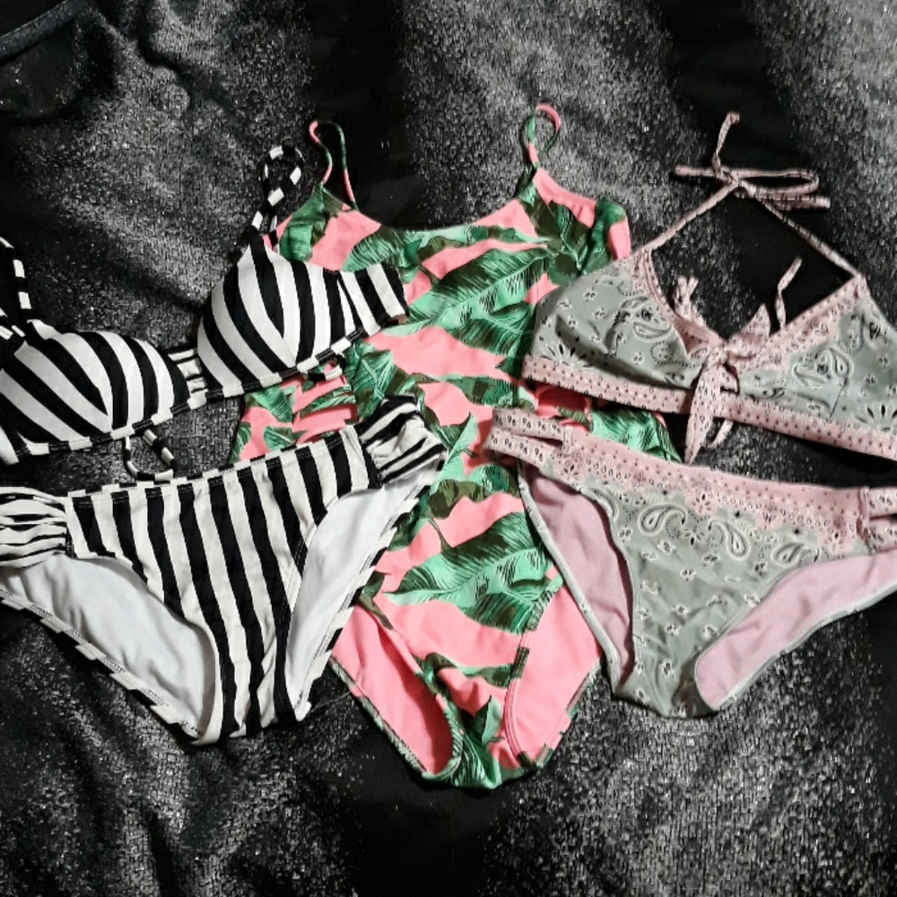 3 swimsuits.